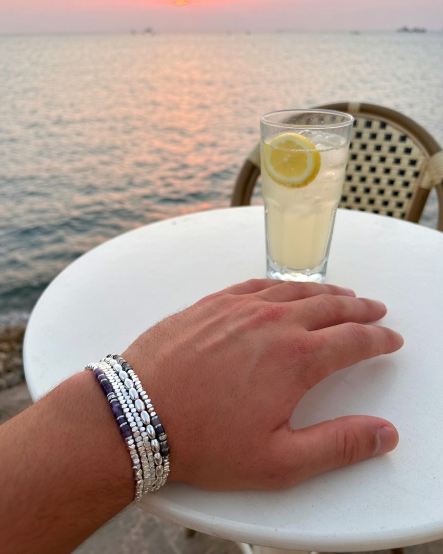 The Amethyst Set at a seaside cafe