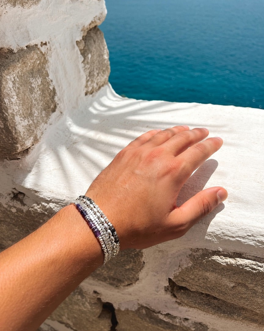The Amethyst Set on a Greek island terrace