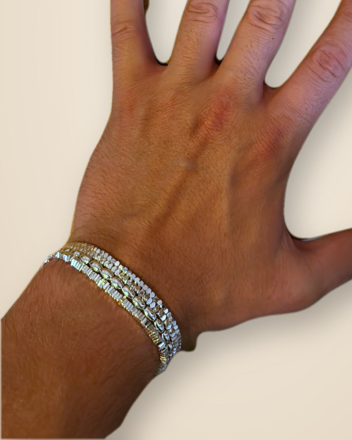 The Silver Trio on the wrist