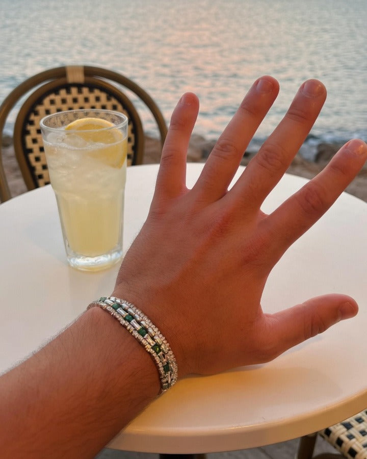 The Verde Set at a seaside cafe at sunset